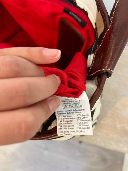 SYNTHESIS. Animal print bag with leather