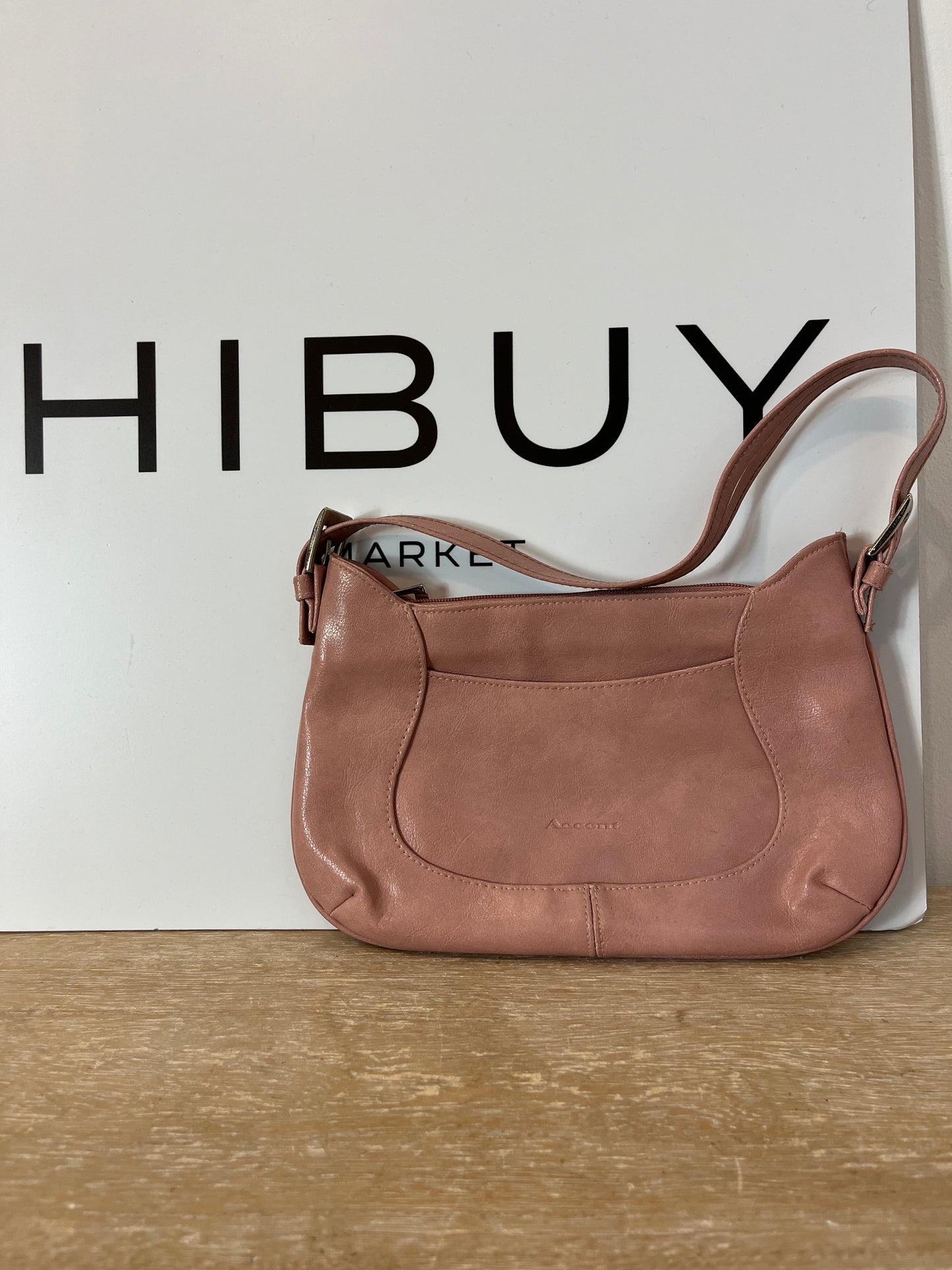 ACCENT. Medium light pink bag.