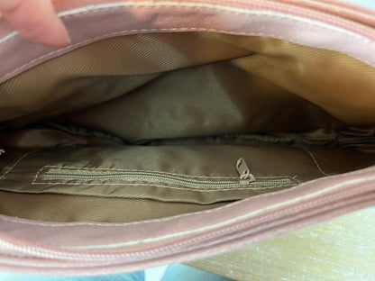 ACCENT. Medium light pink bag.