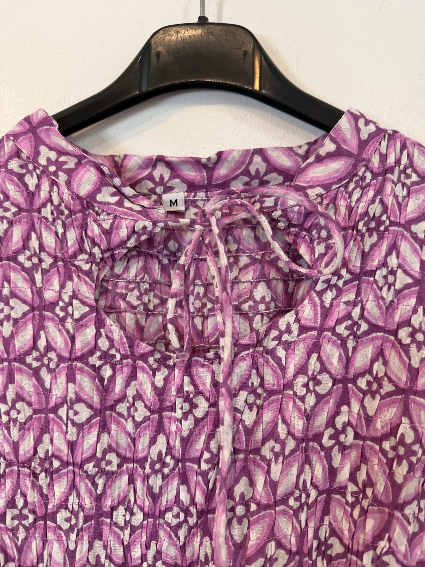 OTRAS. Vestido largo morado estampado