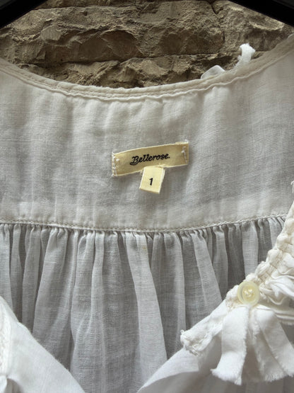 BELLEROSE. Top blanco detalle cuello