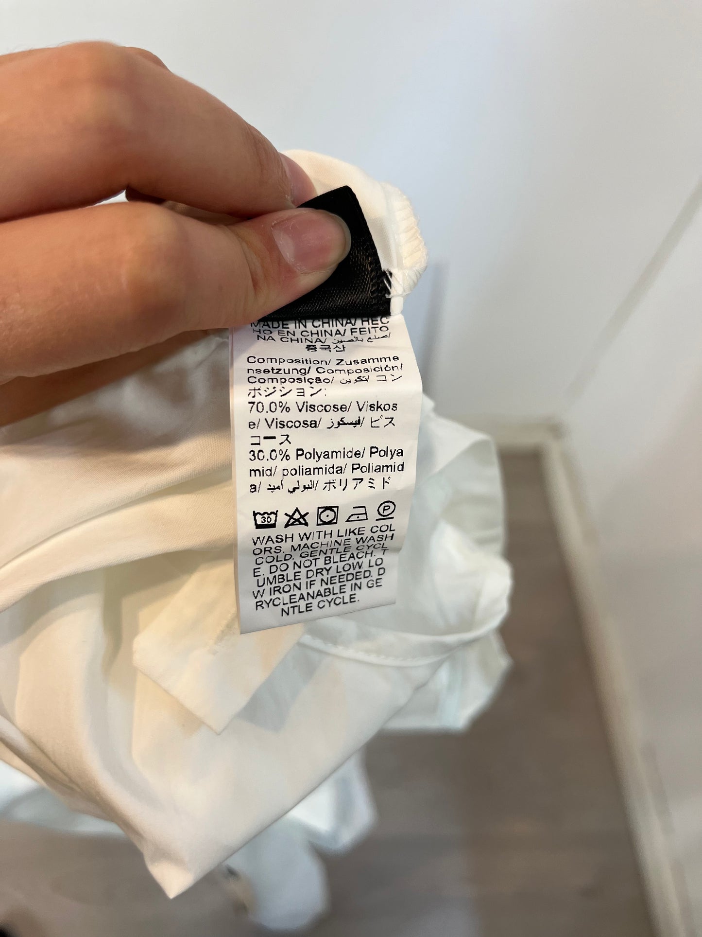 OTRAS. Peto blanco botones negros. T. M