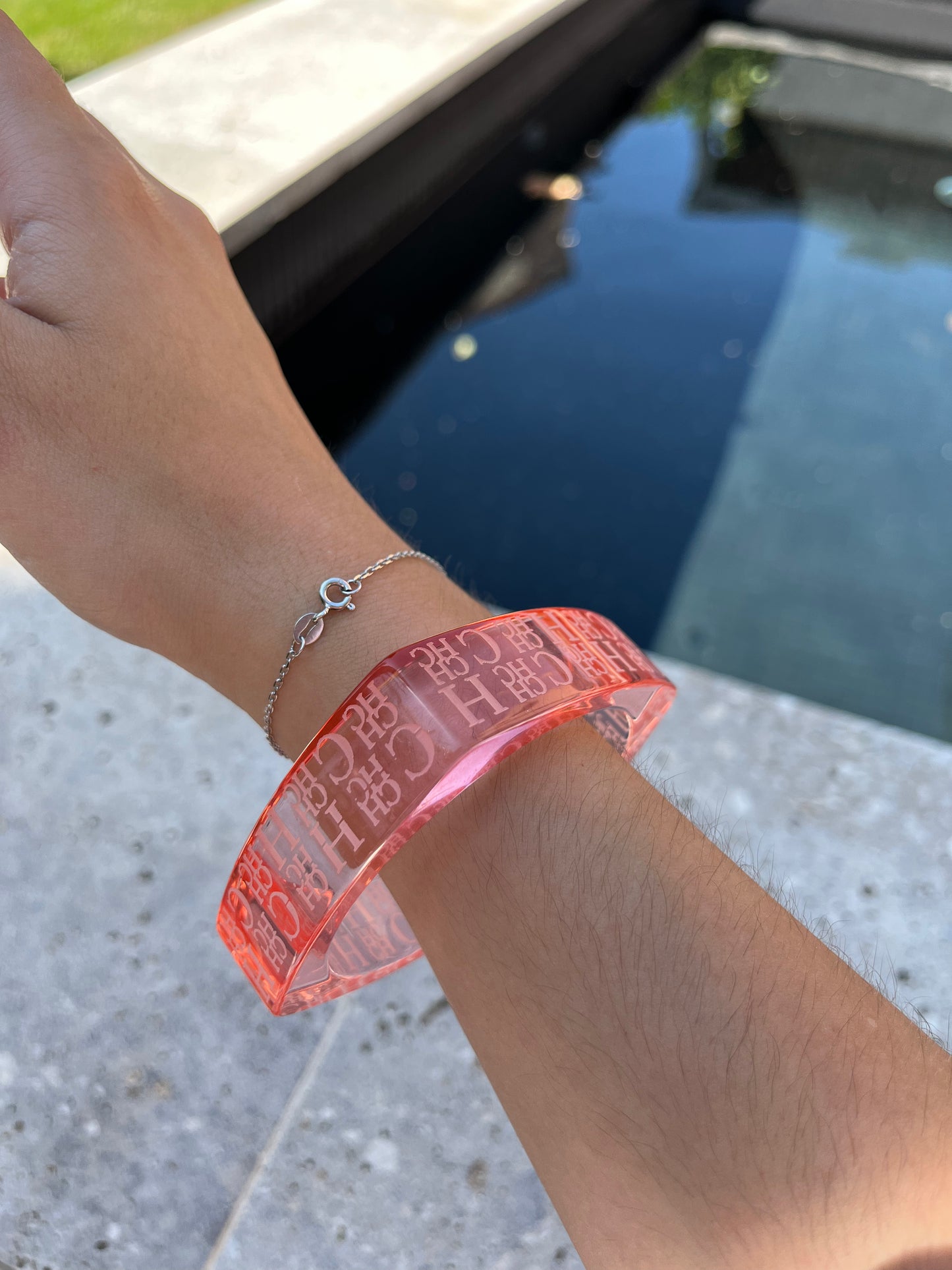 CAROLINA HERRERA. Rigid logo bracelet