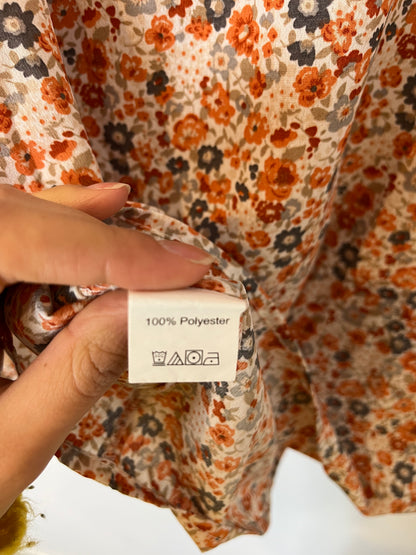 OTRAS. Blusa flores fluida nido de abeja. T M