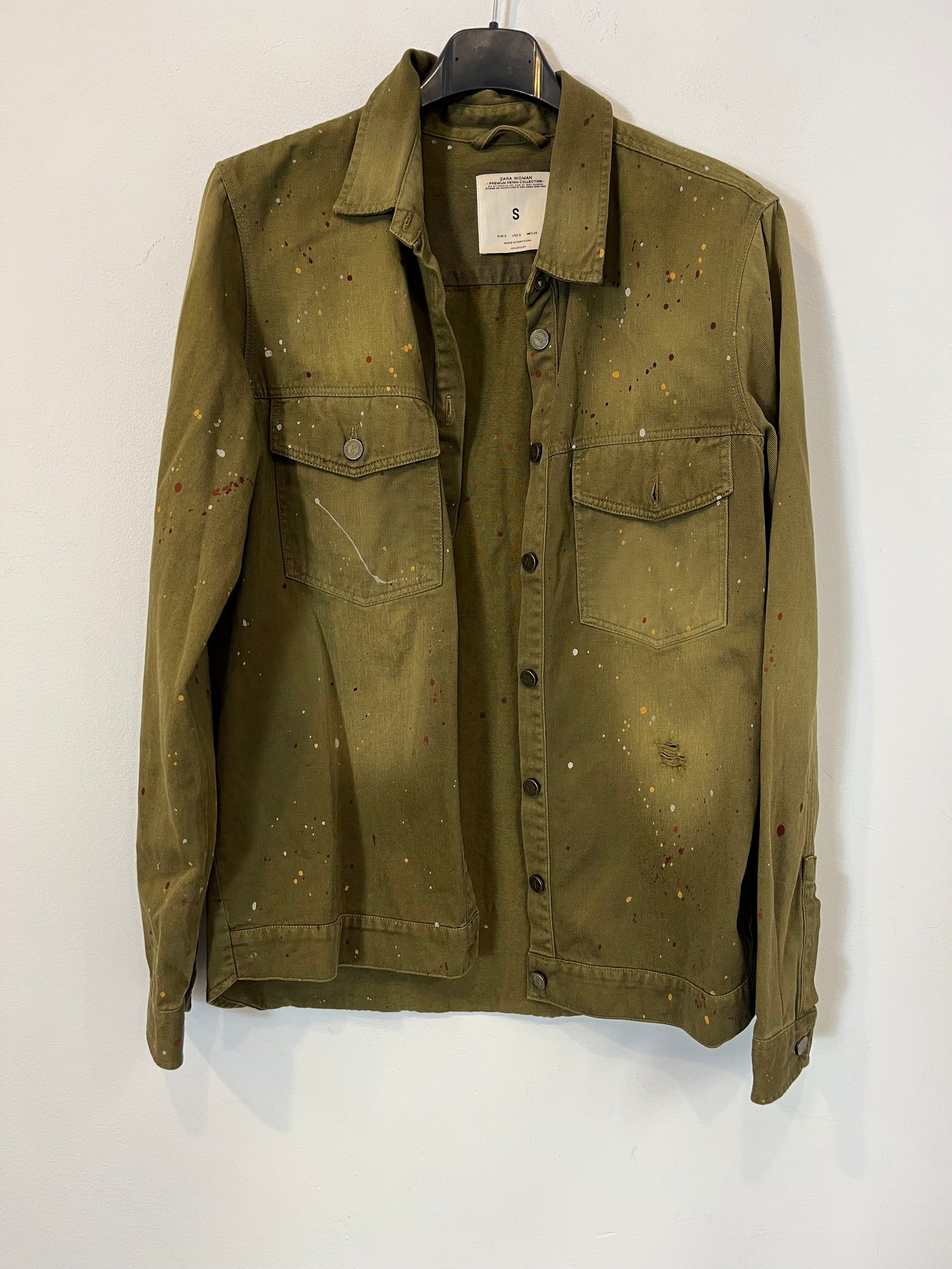 ZARA. On green shirt paint. T.S.