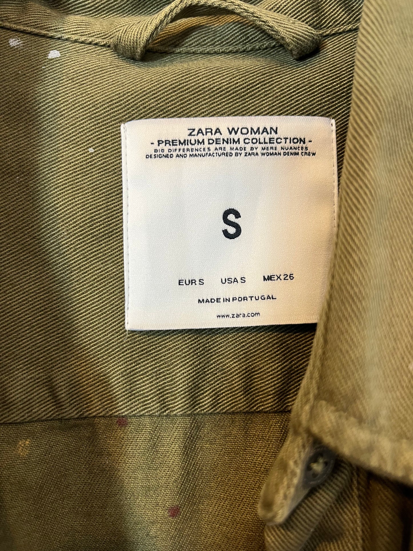 ZARA. On green shirt paint. T.S.