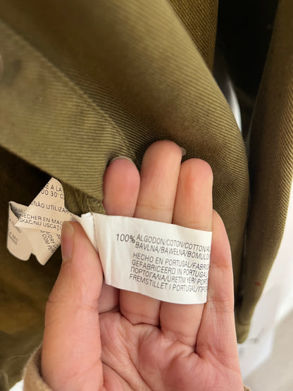 ZARA. On green shirt paint. T.S.