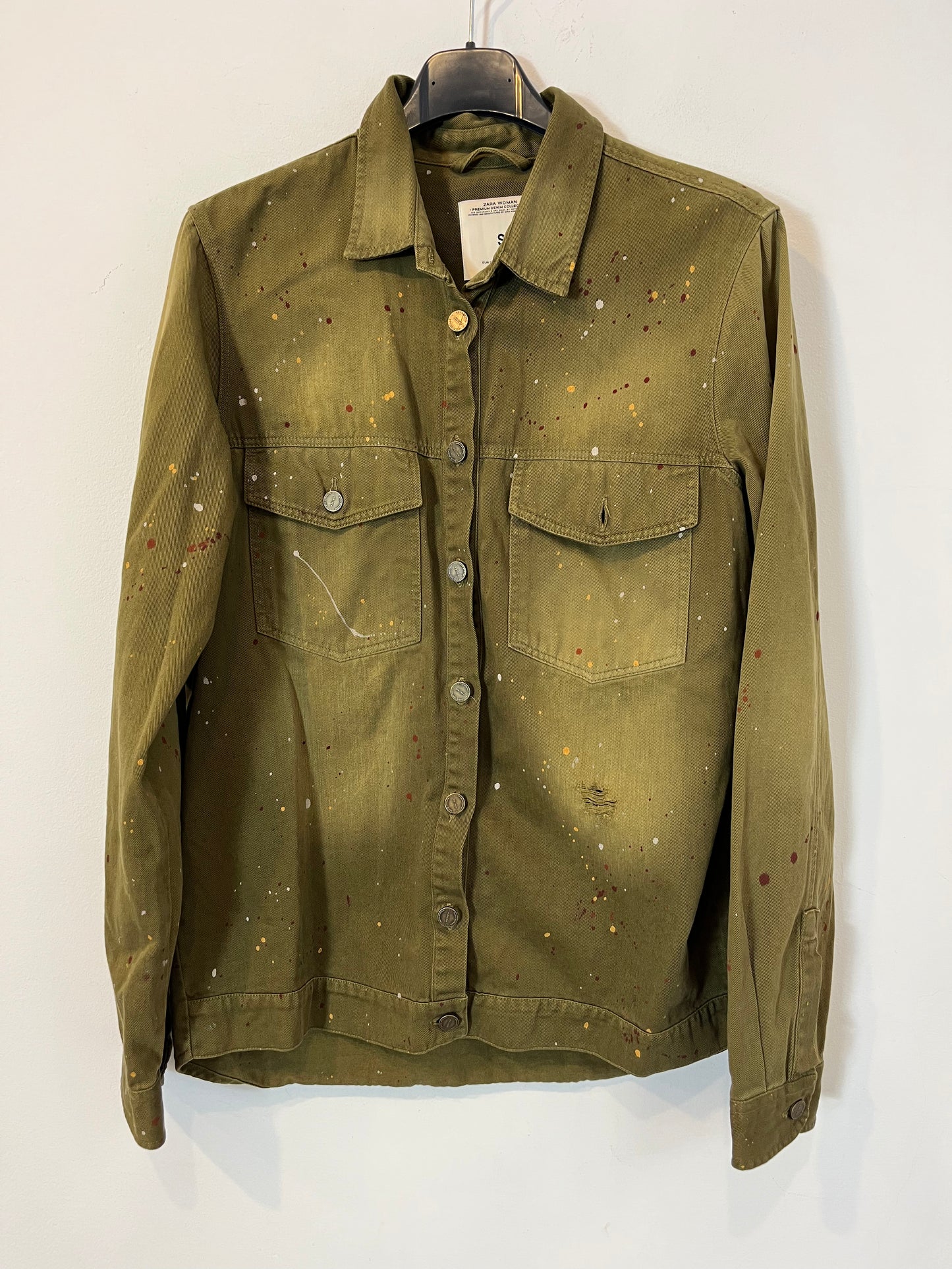 ZARA. On green shirt paint. T.S.