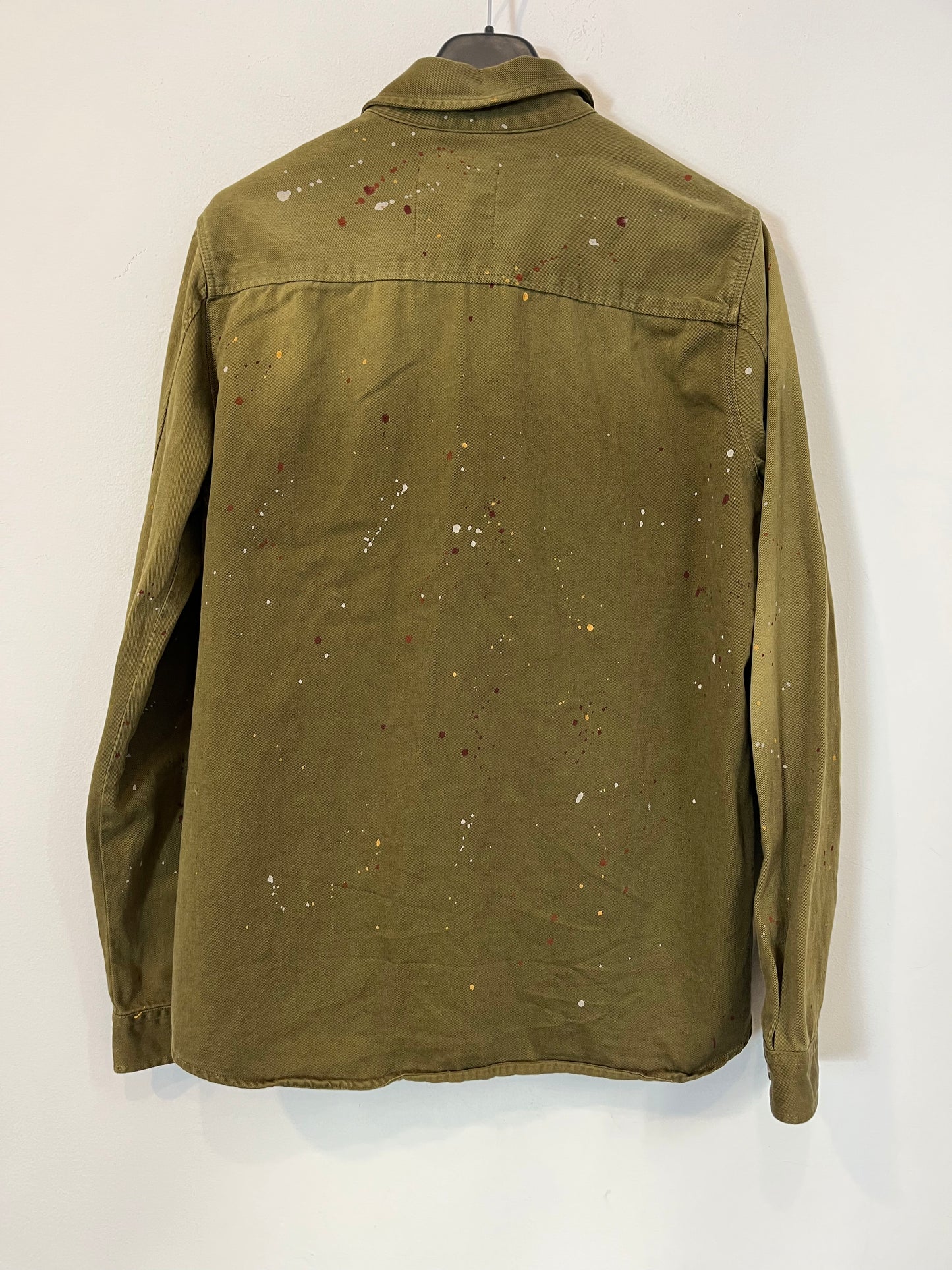 ZARA. On green shirt paint. T.S.