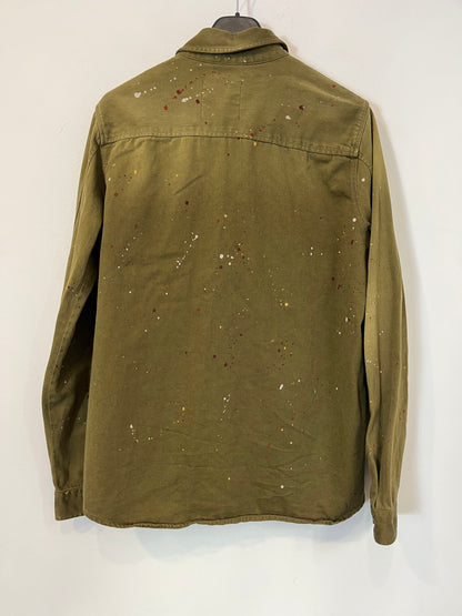 ZARA. On green shirt paint. T.S.