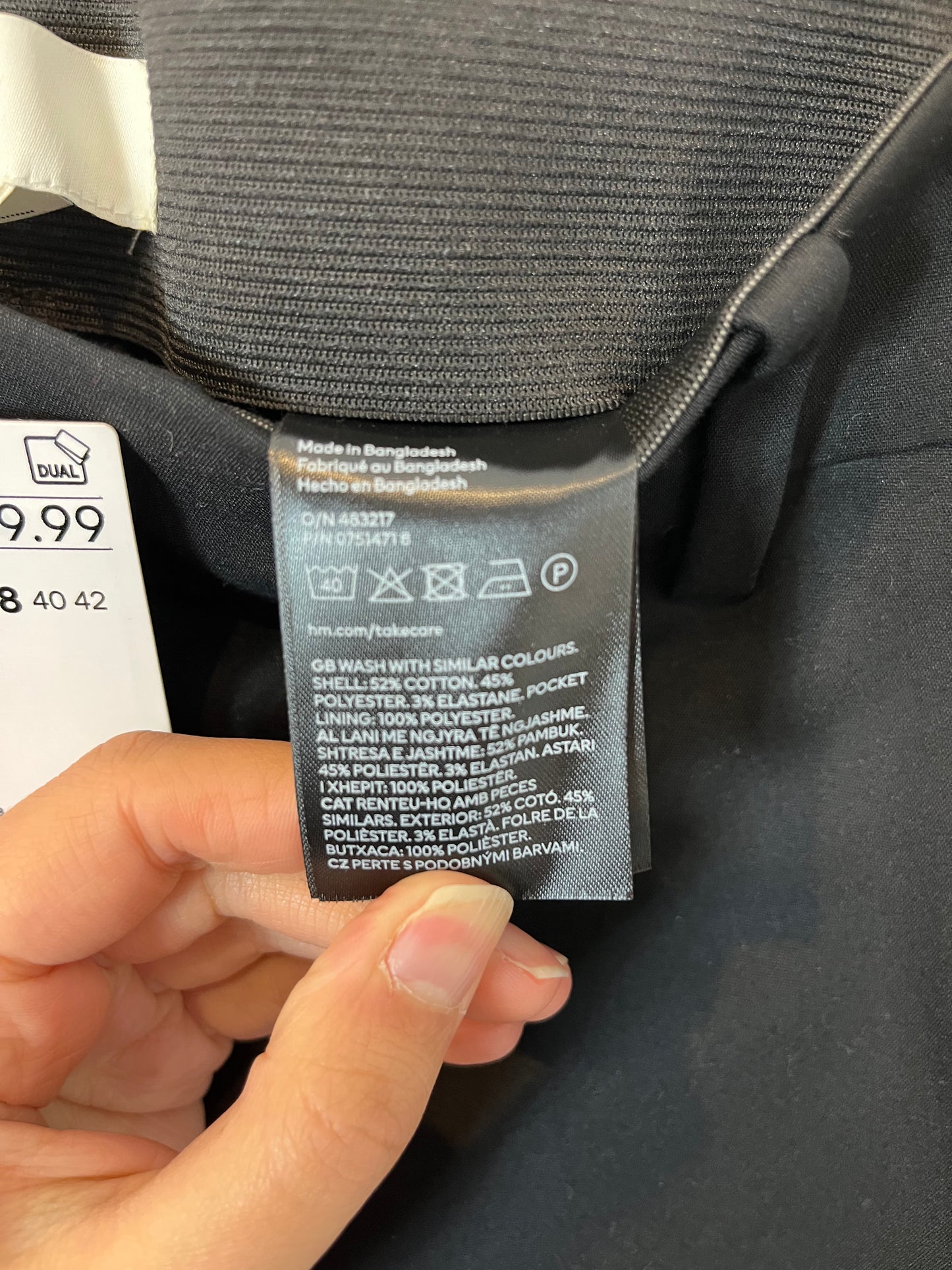 H&M. Pantalón negro pinzas. T 38