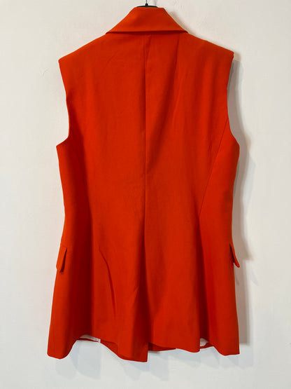 ZARA. Total look naranja chaleco y pantalón. T L/XL