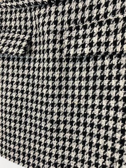 OTRAS. Falda tweed pata de gallo. T 40