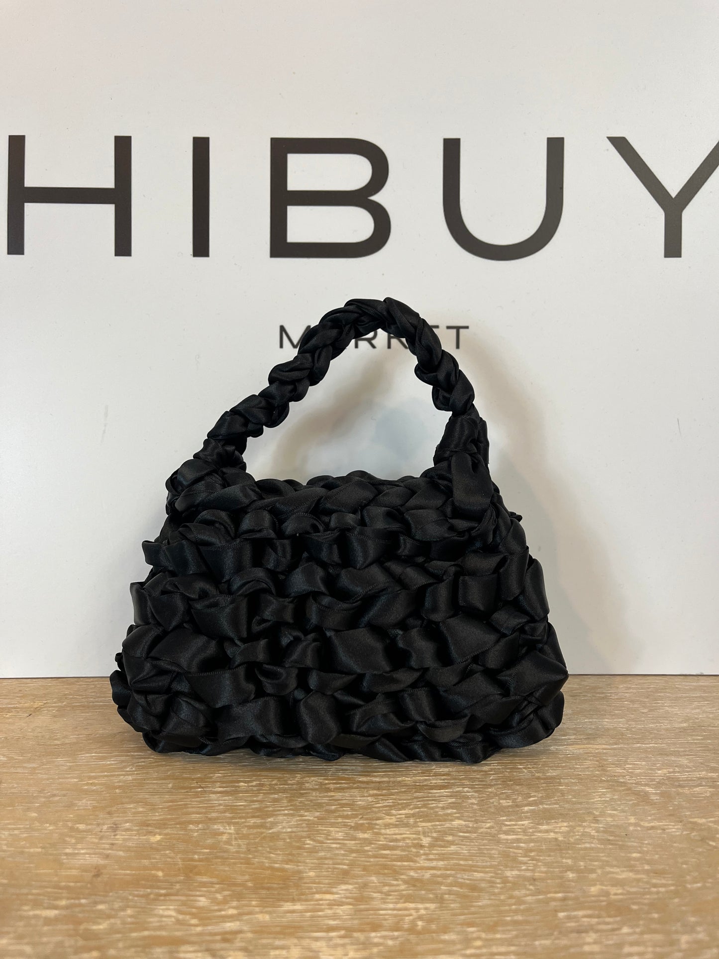 MIISTA LONDON. Bolso de mano seda  trenzado