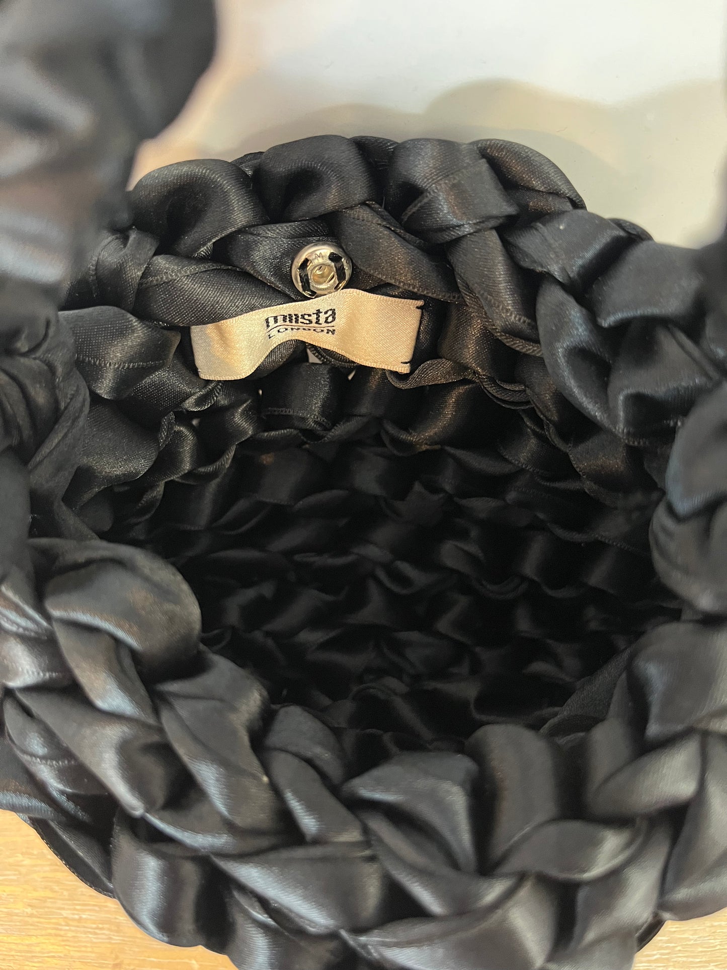 MIISTA LONDON. Bolso de mano seda  trenzado