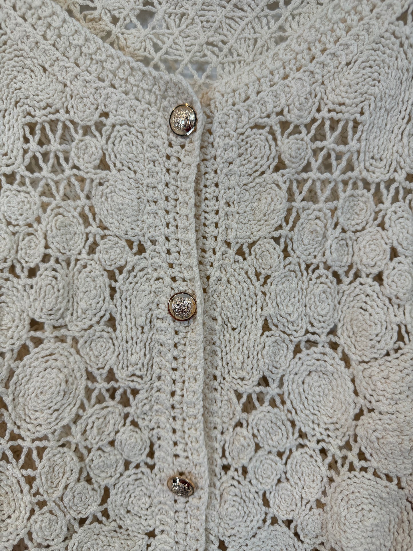 OTRAS. Cárdigan crochet manga 3/4
