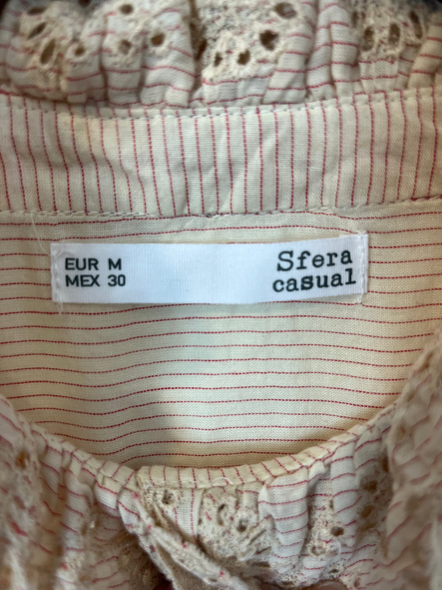 SFERA. Beige blouse with embroidered ruffle. TM