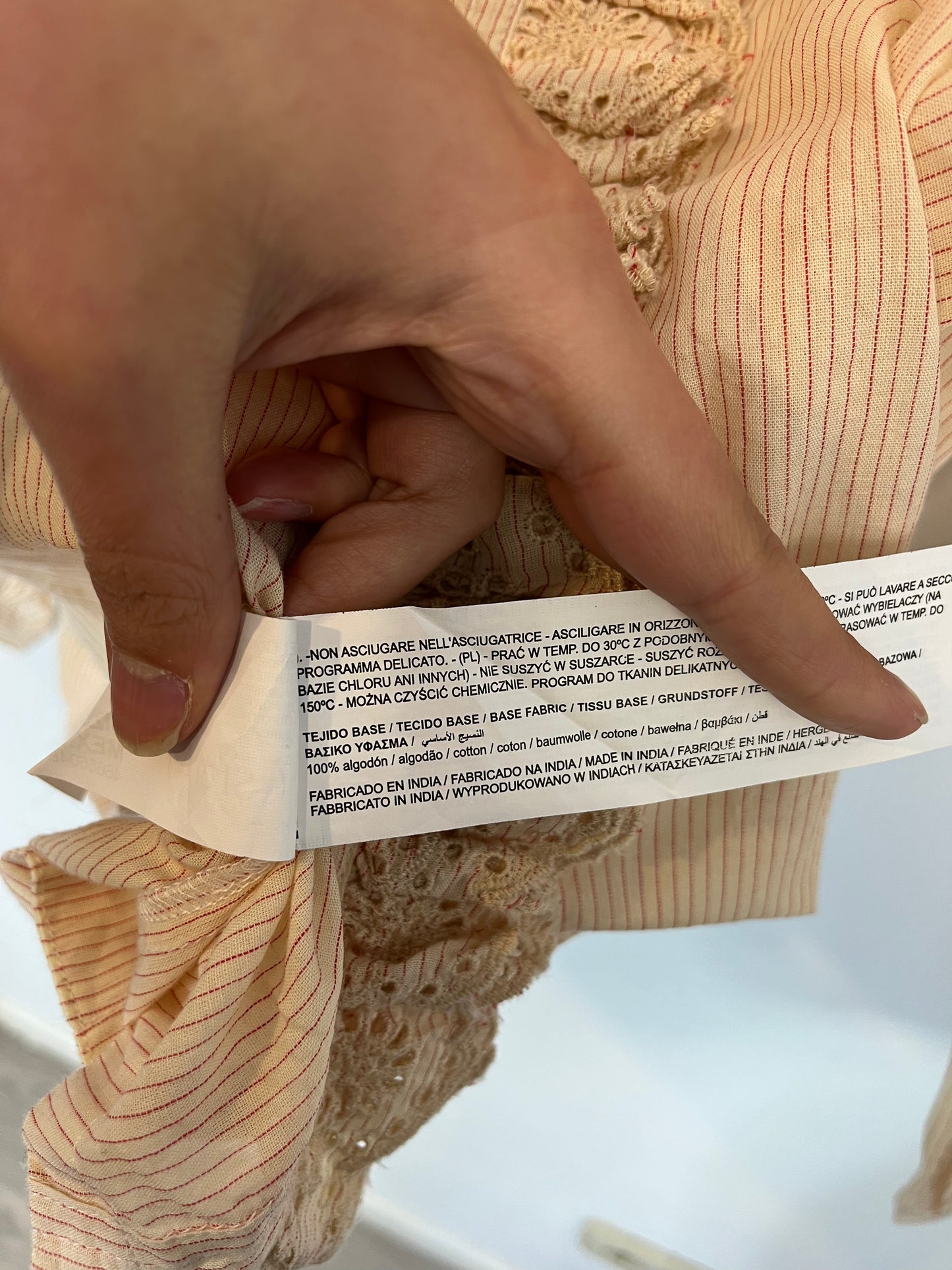 SFERA. Beige blouse with embroidered ruffle. TM