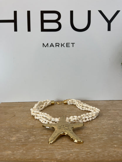 OTRAS. Collar conchas y estrellas