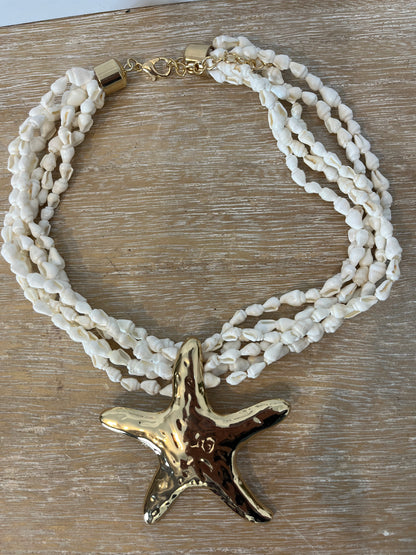 OTRAS. Collar conchas y estrellas