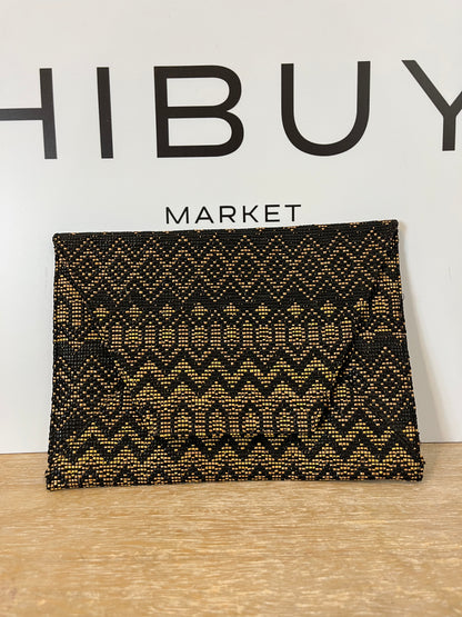 MANGO. Cartera de mano textura bicolor