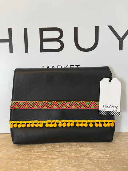 THE CODE. Black tassel clutch