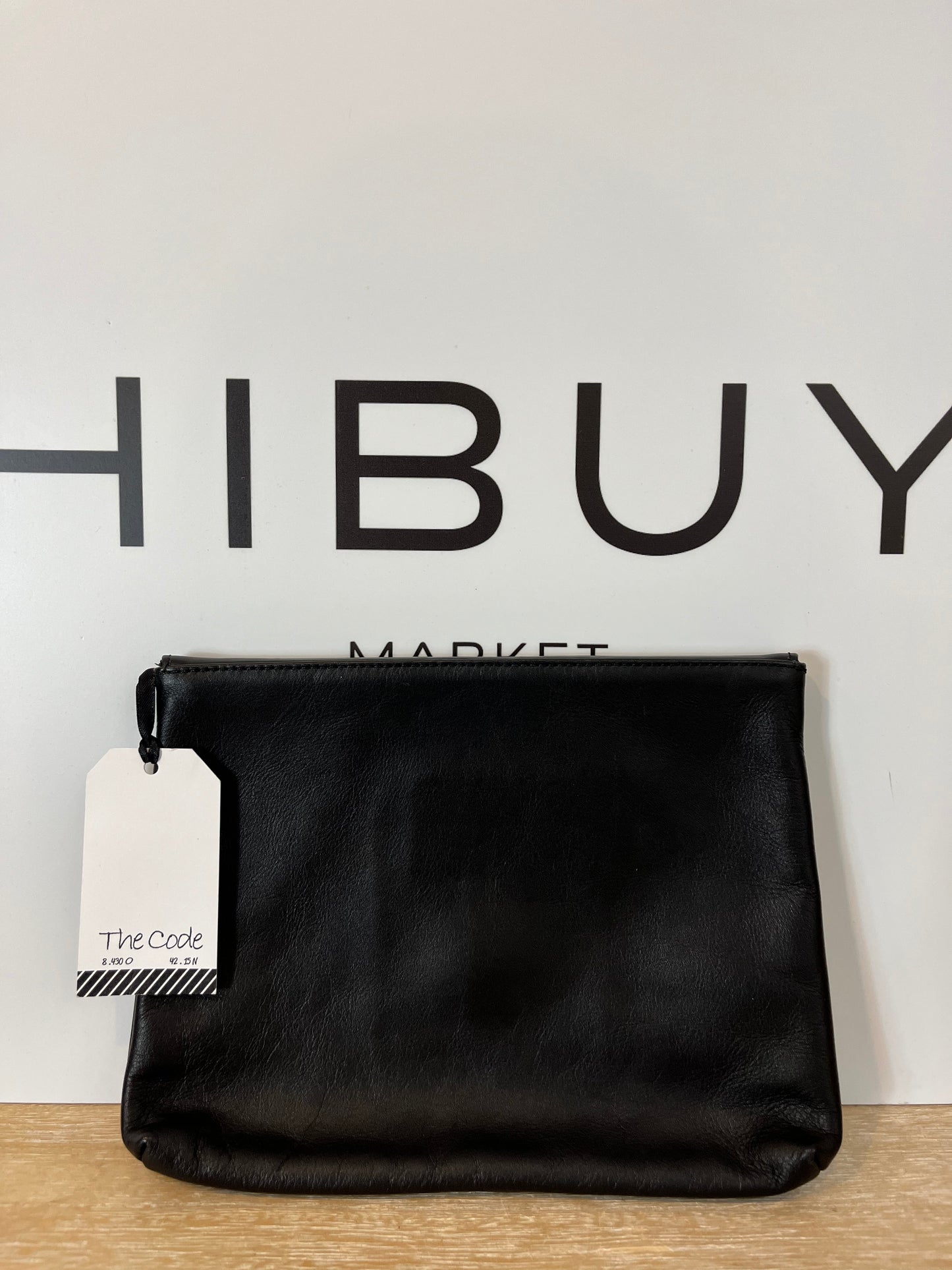 THE CODE. Black tassel clutch