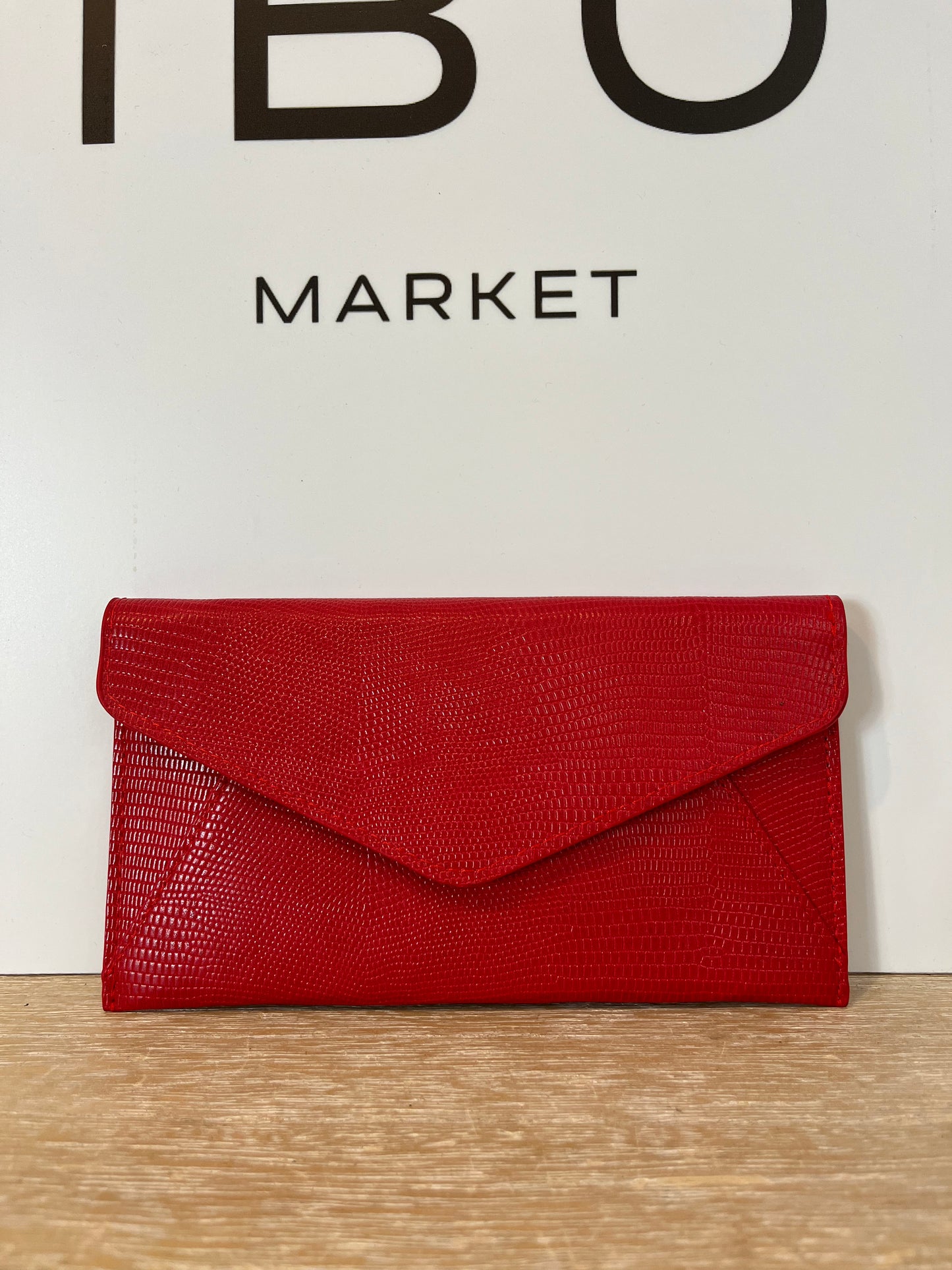 REDONDO BRAND. Cartera roja textura