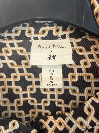 H&M  Richard Allan.  Camisa negra y marrón estampado de cadenas