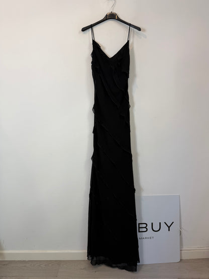 MANGO. Vestido largo negro con tirantes finos y detállele volantes