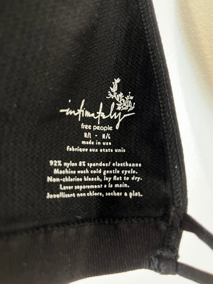 FREE PEOPLE. Top negro elástico espalda tiras. T M/L