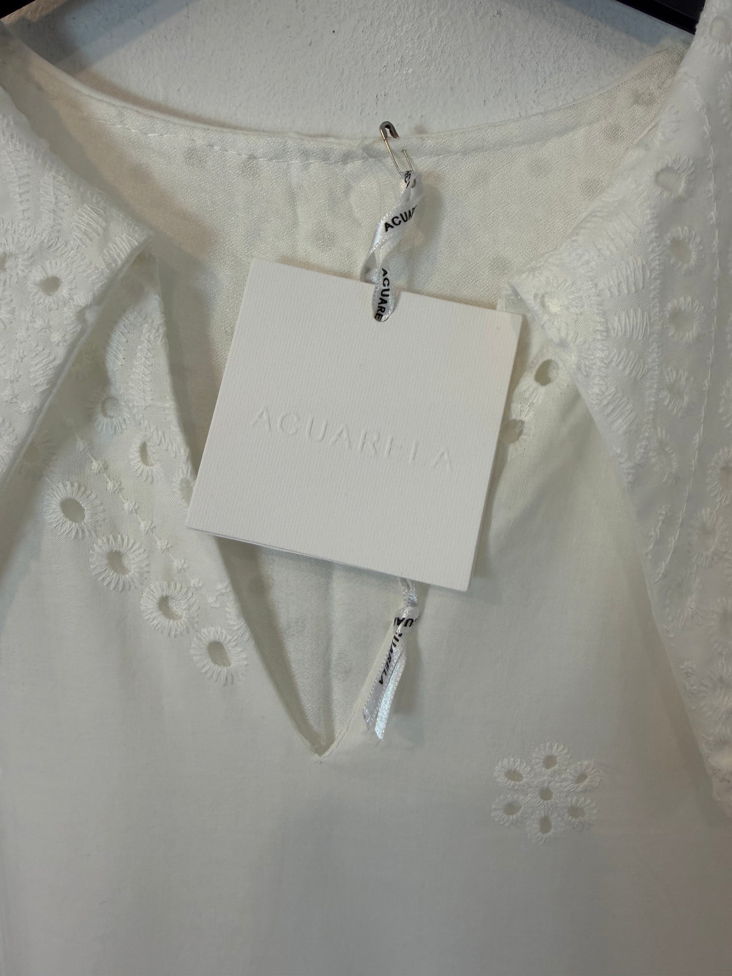 Vestido midi blanco bolsillos