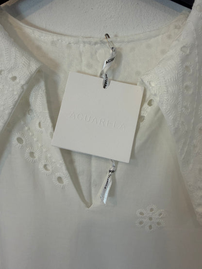 Vestido midi blanco bolsillos