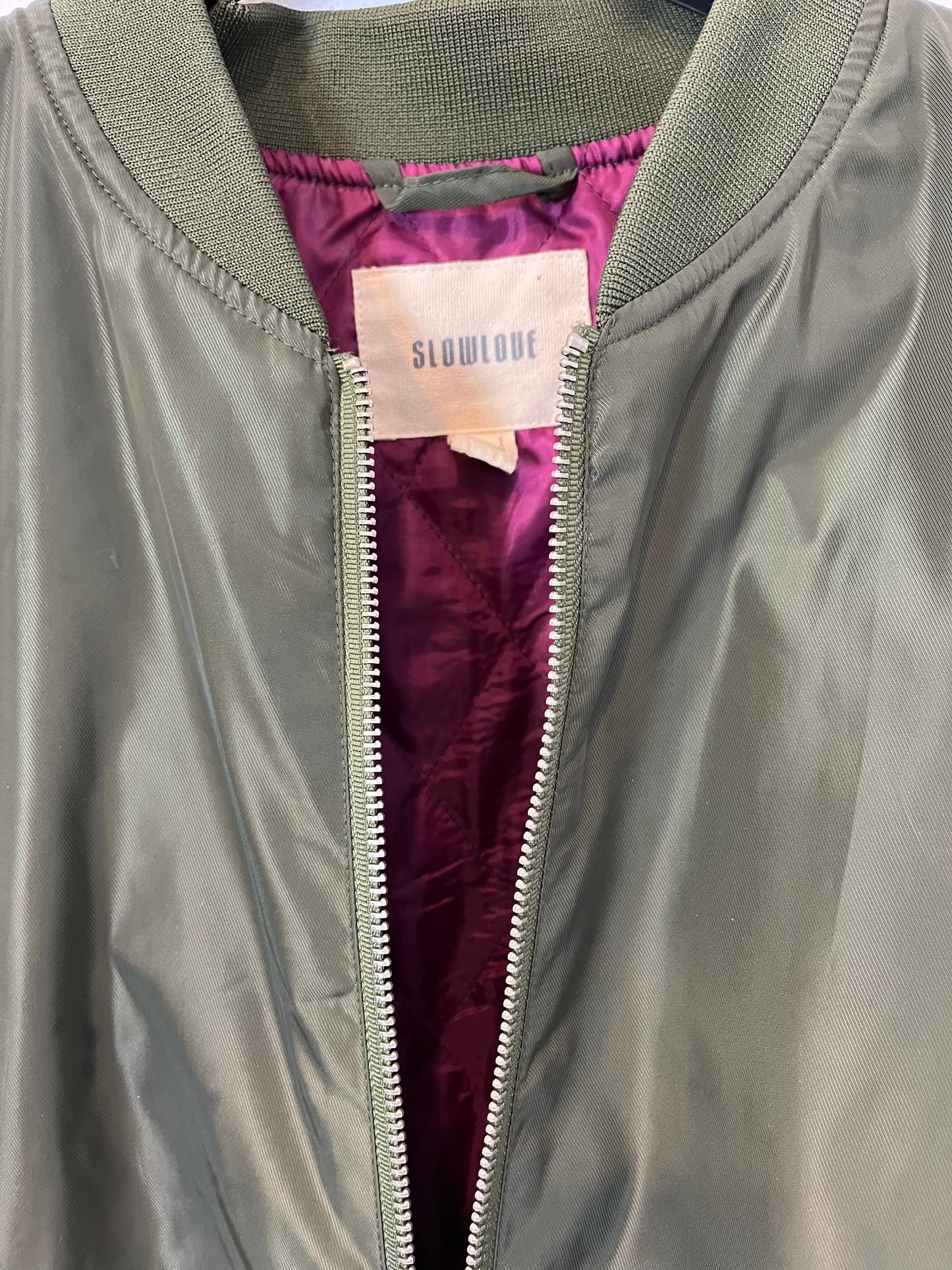 SLOWLOVE. Green bomber jacket with sleeve detail. TS