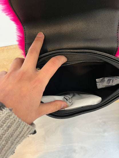 DENNY ROSE. Black bag with pink fur flap
