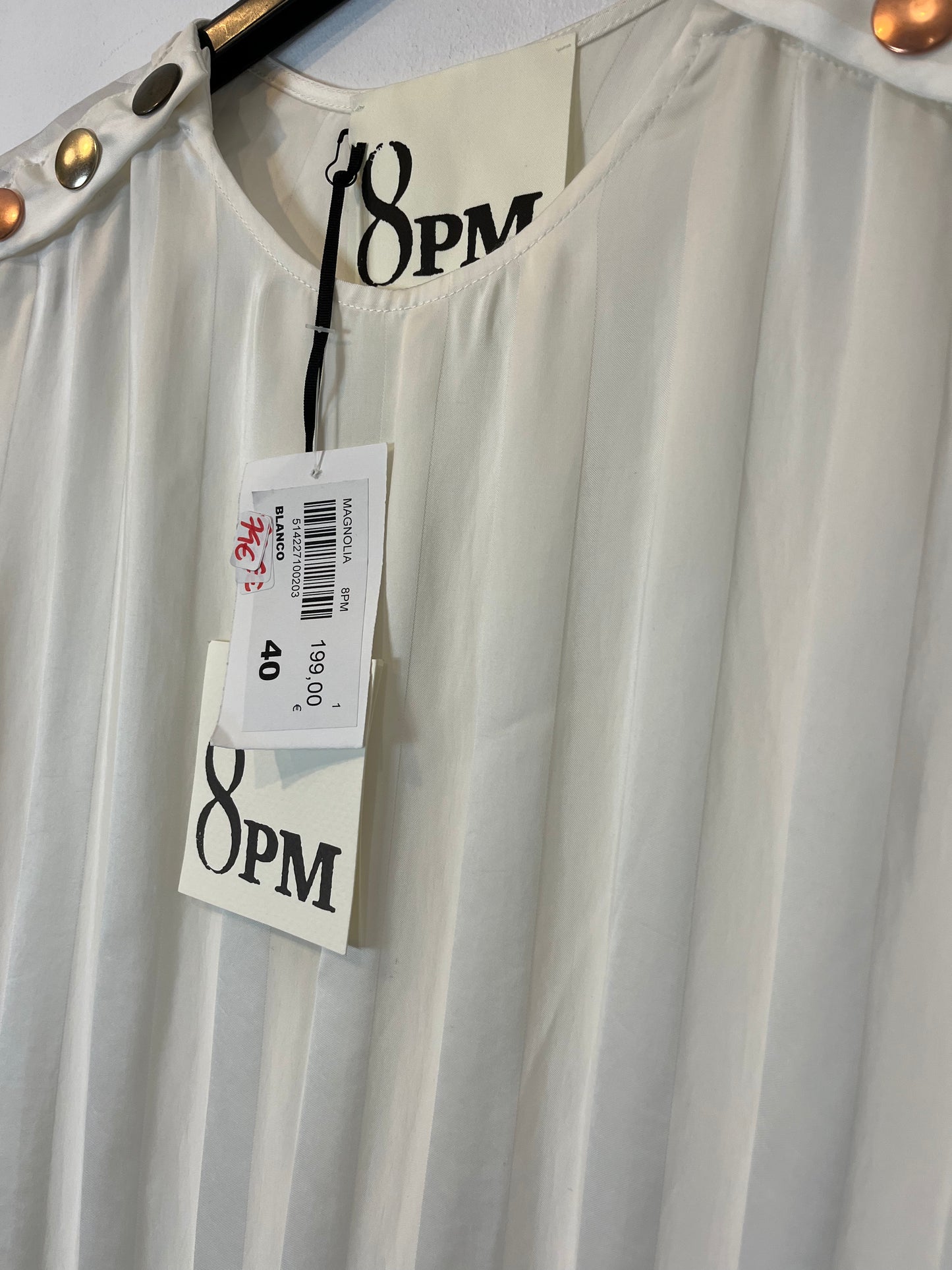 8 PM. Flowy top with striped back detail. TM/L