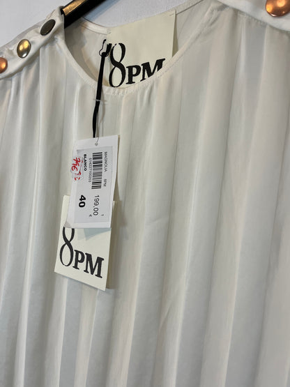 8 PM. Flowy top with striped back detail. TM/L