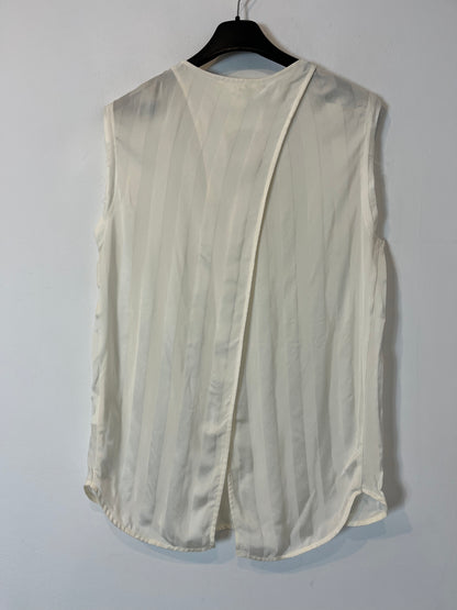 8 PM. Flowy top with striped back detail. TM/L