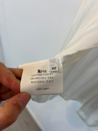 8 PM. Flowy top with striped back detail. TM/L