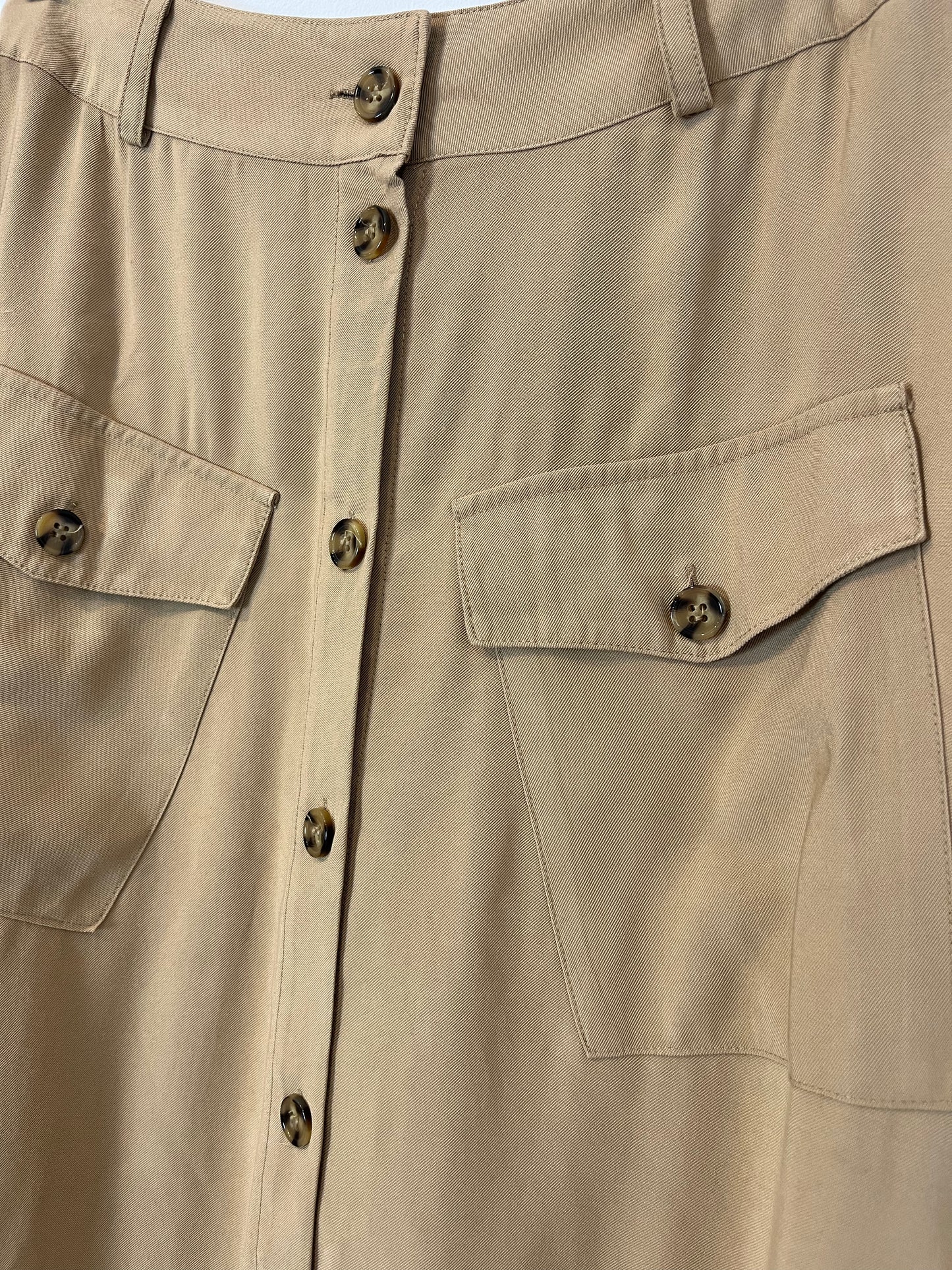 SAINT TROPEZ. Beige midi skirt with Ts buttons