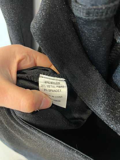 SUPERDOWN. Mono negro purpurina T.l