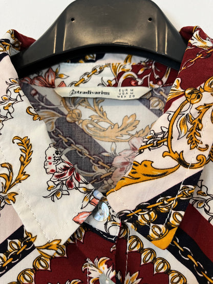 STRADIVARIUS. Blusa rombos y flores T.m