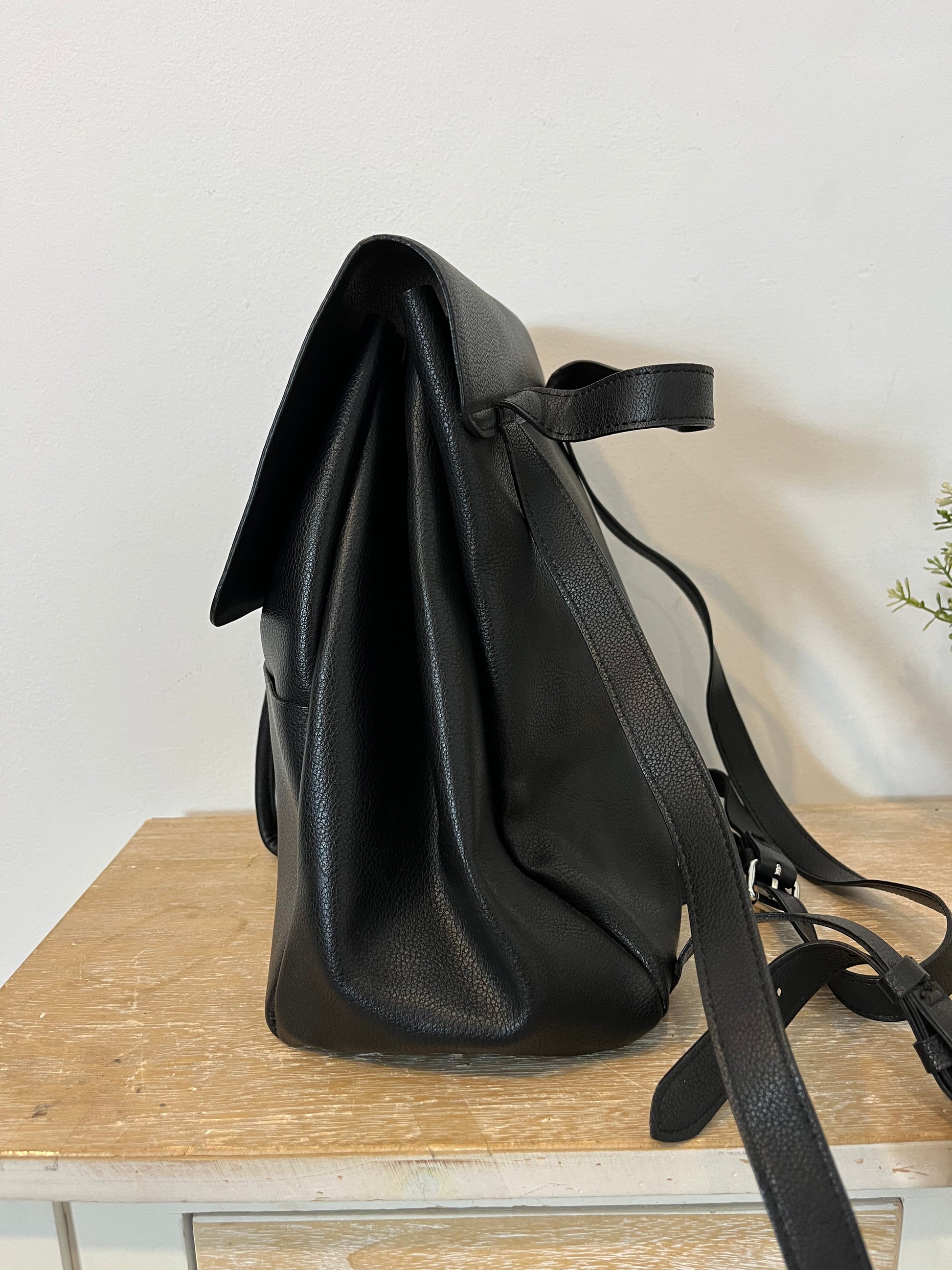 ZARA. Black faux leather backpack