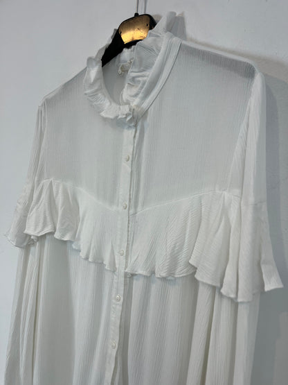 NAME THE BRAND. White ruffled blouse. TL