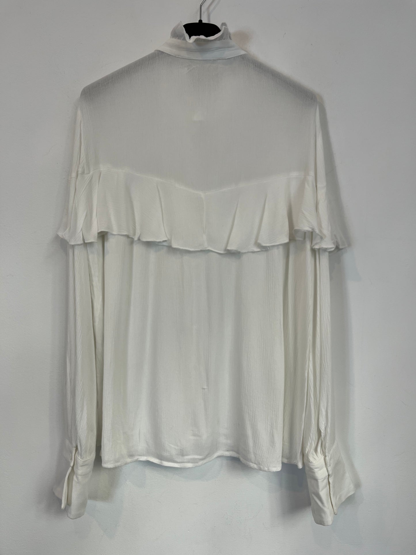 NAME THE BRAND. White ruffled blouse. TL