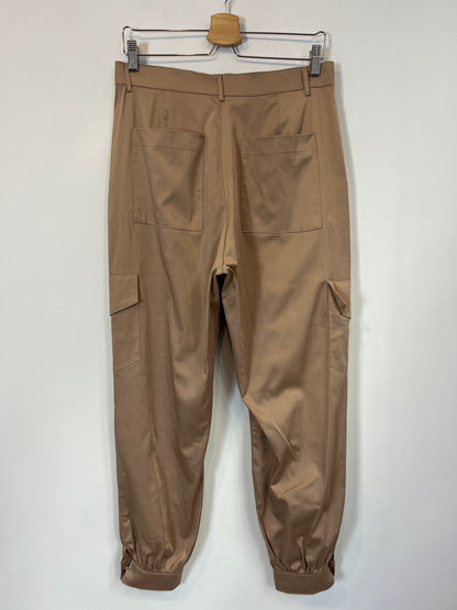 OTHERS. Beige pants with pockets. TM