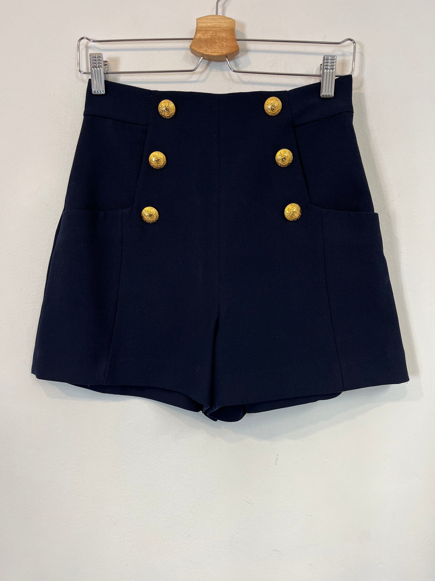 ZARA. Gold-buttoned shorts Ts