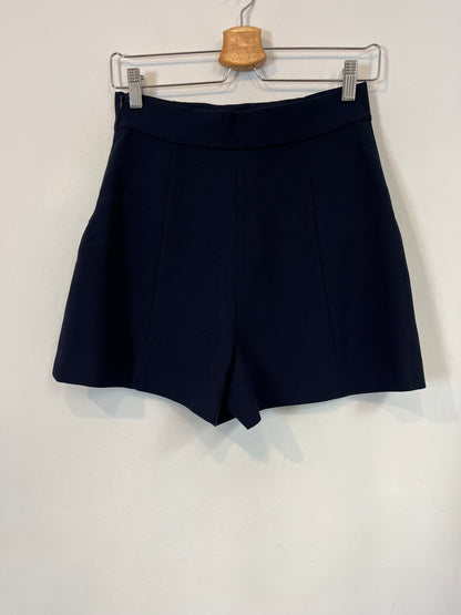 ZARA. Gold-buttoned shorts Ts