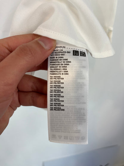 UNIQLO. Flowy white shirt. TS