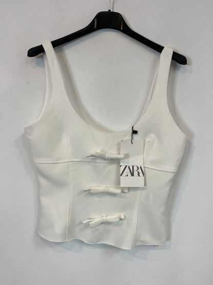 ZARA. Top blanco lazos. T.XS